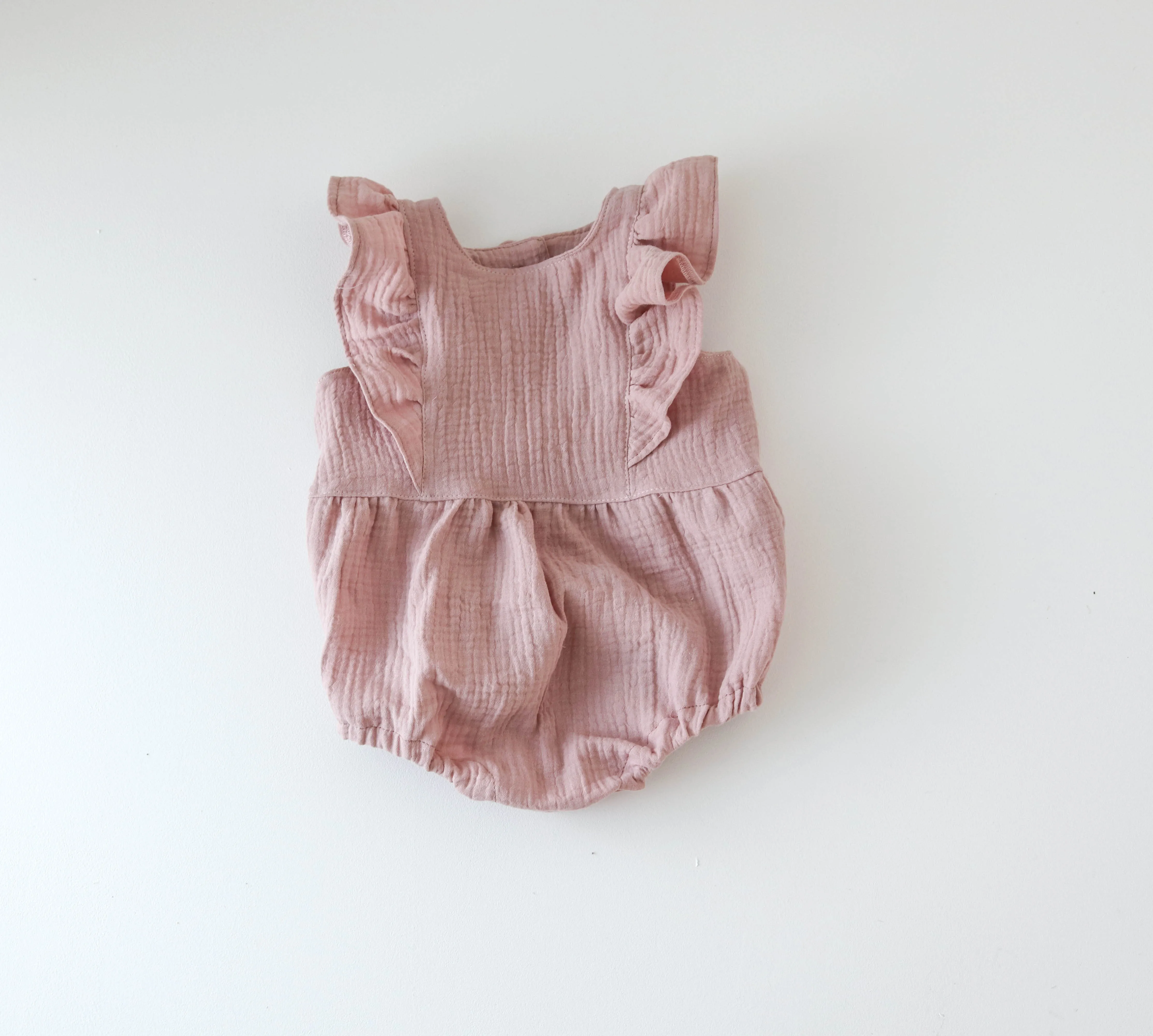 Muslin romper with frills